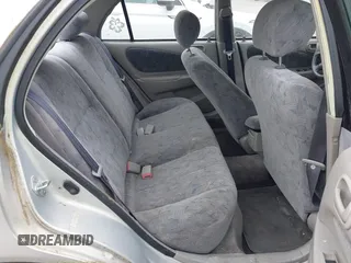 1999 Toyota Corolla VE z VIN 2T1BR12E7XC154444, wystawiony jako IAAI lot #42514069 z przebiegiem 209 377 mil mil oraz . Historia ofert i sprzedaży dostępna na DreamBid. Obrazek 8.