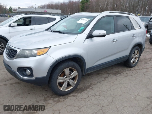 2012 Kia Sorento EX with VIN 5XYKU3A60CG225714, listed as a IAAI auction lot 42057812 with 167,850 mi miles. Bid and sale history available at carsss.com. Image 2.