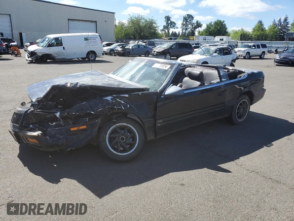 1992 Chrysler LeBaron z VIN 1C3XU4537NF129794, wystawiony jako Copart lot #71594804 z przebiegiem 156 624 mil mil oraz Szkody całkowita. Historia ofert i sprzedaży dostępna na DreamBid. Obrazek 1.
