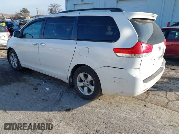 2014 Toyota Sienna LE AAS with VIN 5TDKK3DC2ES483679, listed as a IAAI auction lot 41547261 with 142,697 mi miles. Bid and sale history available at carsss.com. Image 3.