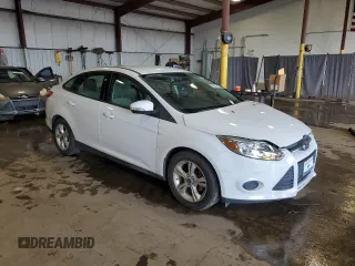 2013 Ford Focus SE with VIN 1FADP3F22DL249403, listed as a Copart auction lot 62295645 with 83,328 mi miles and Salvage title. Bid and sale history available at DreamBid. Image 4.