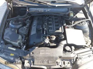 2004 BMW 3 Series 325Ci with VIN WBABW33454PG97847, listed as a IAAI auction lot 41903694 with 127,612 mi miles. Bid and sale history available at carsss.com. Image 10.