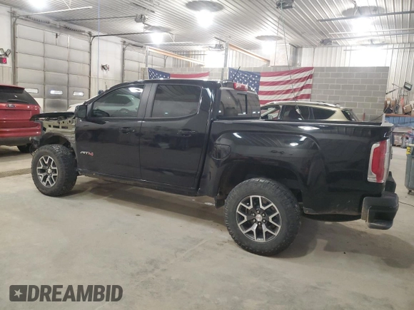 2021 GMC Canyon 4WD AT4 w/Cloth with VIN 1GTG6FEN2M1265863, listed as a Copart auction lot 49900865 with 50,102 mi miles and Salvage Title. Bid and sale history available at carsss.com. Image 2.