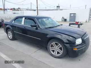 2006 Chrysler 300 Touring with VIN 2C3KA53G76H200278, listed as a IAAI auction lot 42044879 with 122,601 mi miles and . Bid and sale history available at DreamBid. Image 1.