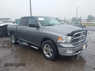 2012 Ram 1500 Outdoorsman z VIN 1C6RD7LT2CS215129, wystawiony jako IAAI lot #42278106 z przebiegiem 106 825 mil mil oraz . Historia ofert i sprzedaży dostępna na DreamBid. Obrazek 1.