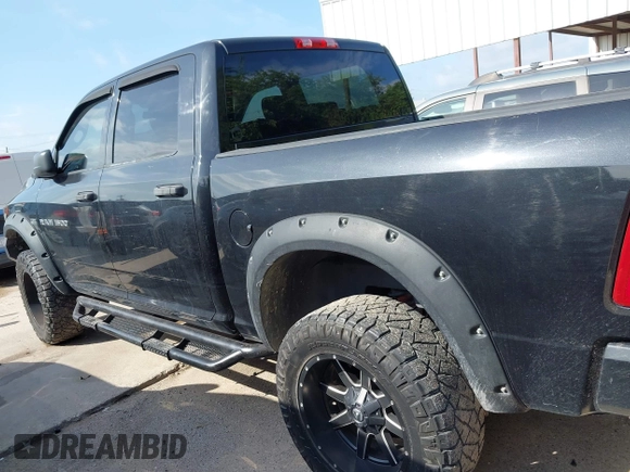 2011 Ram 1500 Big Horn with VIN 1D7RV1CT8BS642919, listed as a IAAI auction lot 42746511 with 87,929 mi miles and . Bid and sale history available at DreamBid. Image 14.