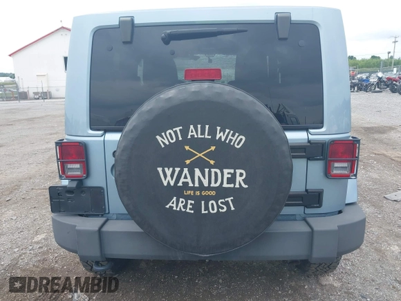 2012 Jeep Wrangler Arctic with VIN 1C4AJWBG7CL148325, listed as a IAAI auction lot 39943602 with 86,625 mi miles and . Bid and sale history available at DreamBid. Image 16.