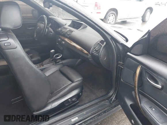 2012 BMW 1 Series 128i with VIN WBAUN1C51CVH84311, listed as a IAAI auction lot 41551912 with 147,052 mi miles and . Bid and sale history available at DreamBid. Image 5.