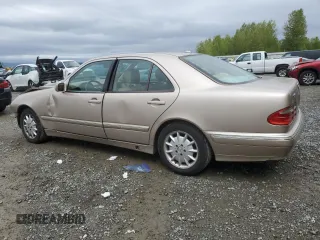 2001 Mercedes-Benz E-Class with VIN WDBJF65J51B378052, listed as a Copart auction lot 55057915 with 228,896 mi miles and Salvage Title. Bid and sale history available at carsss.com. Image 2.