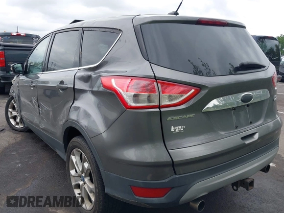 2013 Ford Escape SEL z VIN 1FMCU9H96DUC66206, wystawiony jako IAAI lot #42376442 z przebiegiem 96 776 mil mil oraz . Historia ofert i sprzedaży dostępna na DreamBid. Obrazek 3.