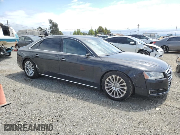 2015 Audi A8 4.0T с VIN WAU32AFD1FN012156, выставлен на аукционе Copart как лот 52759185 с пробегом 117 498 миль миль и Списание • Salvage title. История ставок и продаж доступна на DreamBid. Изображение 4.