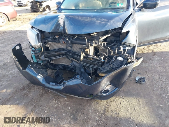 2016 Nissan Rogue SL with VIN 5N1AT2MV0GC869568, listed as a IAAI auction lot 41218647 with 81,057 mi miles and . Bid and sale history available at DreamBid. Image 6.