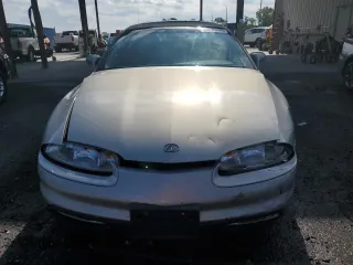 1997 Oldsmobile Aurora with VIN 1G3GR62C0V4102252, listed as a Copart auction lot 53270245 with 123,615 mi miles and Salvage Title. Bid and sale history available at DreamBid. Image 5.