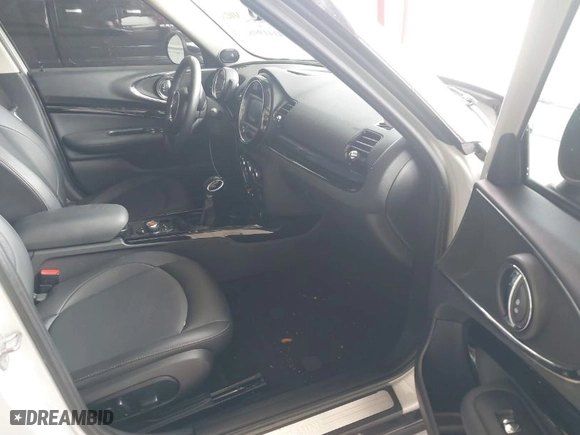 2019 MINI Cooper Clubman with VIN WMWLN5C53K2E34830, listed as a IAAI auction lot 41419983 with 64,716 mi miles. Bid and sale history available at carsss.com. Image 5.
