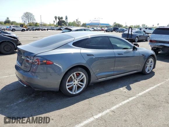 2014 Tesla Model S 60 z VIN 5YJSA1H17EFP36595, wystawiony jako Copart lot #53705035 z przebiegiem 148 254 mil mil oraz Szkoda całkowita • Salvage title. Historia ofert i sprzedaży dostępna na DreamBid. Obrazek 3.