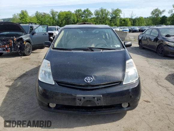 2004 Toyota Prius z VIN JTDKB20U640071890, wystawiony jako Copart lot #58633435 z przebiegiem Nie podano mil oraz Czysty tytuł • Clean title. Historia ofert i sprzedaży dostępna na DreamBid. Obrazek 5.