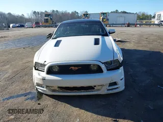 2013 Ford Mustang GT with VIN 1ZVBP8CF1D5208753, listed as a IAAI auction lot 41754011 with 158,809 mi miles and . Bid and sale history available at DreamBid. Image 13.