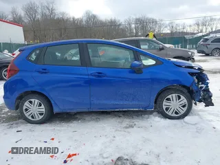2020 Honda Fit LX z VIN 3HGGK5H43LM716911, wystawiony jako IAAI lot #41410480 z przebiegiem 71 983 mil mil oraz . Historia ofert i sprzedaży dostępna na DreamBid. Obrazek 14.