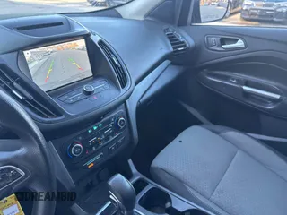 2018 Ford Escape SE with VIN 1FMCU9GD8JUA76991, listed as a IAAI auction lot 42013849 with 213,827 mi miles. Bid and sale history available at carsss.com. Image 6.