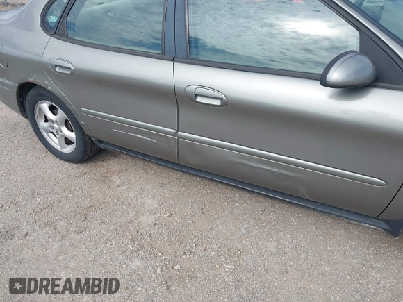 2004 Ford Taurus z VIN 1FAHP55U74G112479, wystawiony jako IAAI lot #42207775 z przebiegiem 97 491 mil mil oraz . Historia ofert i sprzedaży dostępna na DreamBid. Obrazek 6.