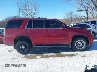2015 GMC Yukon SLE with VIN 1GKS2AKC2FR514005, listed as a IAAI auction lot 41292783 with 129,413 mi miles. Bid and sale history available at carsss.com. Image 13.