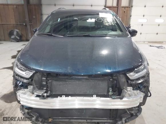 2023 Chrysler Pacifica Hybrid Limited with VIN 2C4RC1S74PR554723, listed as a IAAI auction lot 41317141 with 16,960 mi miles. Bid and sale history available at carsss.com. Image 6.