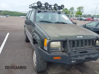 1995 Jeep Grand Cherokee Laredo with VIN 1J4GZ58SXSC508592, listed as a IAAI auction lot 42686157 with 158,462 mi miles and . Bid and sale history available at DreamBid. Image 1.