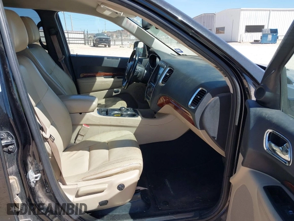 2016 Dodge Durango Limited with VIN 1C4RDHDG9GC360118, listed as a IAAI auction lot 41696388 with 217,550 mi miles. Bid and sale history available at carsss.com. Image 5.