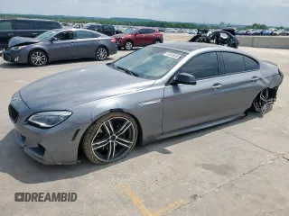 2018 BMW 6 Series 650i z VIN WBA6D4C59JD981398, wystawiony jako Copart lot #53455655 z przebiegiem 19 752 mil mil oraz Szkody całkowita. Historia ofert i sprzedaży dostępna na DreamBid. Obrazek 1.