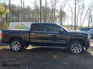 2018 GMC Sierra 1500 Denali with VIN 3GTU2PEJ5JG308087, listed as a IAAI auction lot 41343443 with 108,644 mi miles. Bid and sale history available at carsss.com. Image 12.