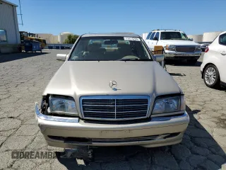1998 Mercedes-Benz C 230/260/280/320 with VIN WDBHA23G4WA564563, listed as a Copart auction lot 71414284 with 277,741 mi miles and Salvage Title. Bid and sale history available at carsss.com. Image 5.