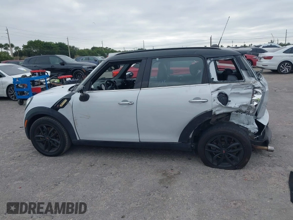 2015 MINI Countryman S z VIN WMWZC3C5XFWP53190, wystawiony jako IAAI lot #41273123 z przebiegiem 163 658 mil mil oraz . Historia ofert i sprzedaży dostępna na DreamBid. Obrazek 14.