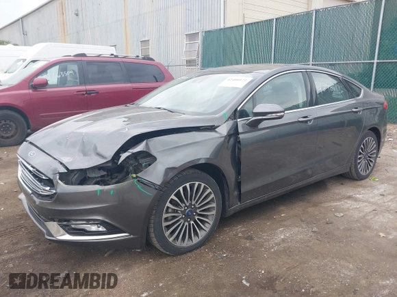2017 Ford Fusion Titanium with VIN 3FA6P0K96HR208757, listed as a IAAI auction lot 42400172 with 90,000 mi miles and . Bid and sale history available at DreamBid. Image 2.