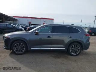 2016 Mazda CX-9 Signature with VIN JM3TCBEY7G0112486, listed as a IAAI auction lot 41592723 with 91,392 mi miles. Bid and sale history available at carsss.com. Image 14.