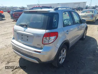 2009 Suzuki SX4 Touring AWD with VIN JS2YB417295100879, listed as a IAAI auction lot 41979405 with 69,625 mi miles and . Bid and sale history available at DreamBid. Image 4.