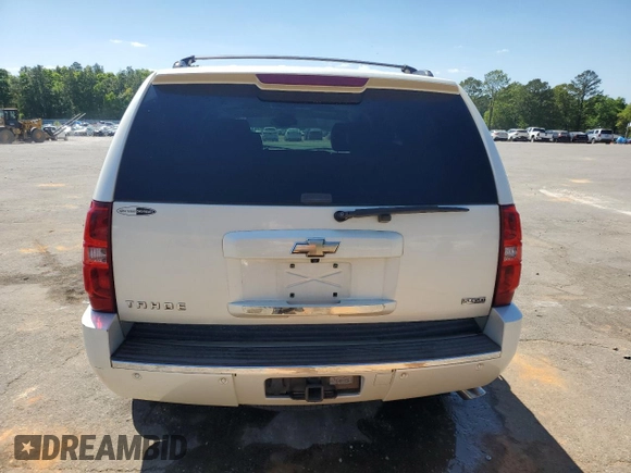 2009 Chevrolet Tahoe LTZ с VIN 1GNFC33009R171376, выставлен на аукционе Copart как лот 52502895 с пробегом 240 712 миль миль и Списание • Salvage title. История ставок и продаж доступна на DreamBid. Изображение 6.