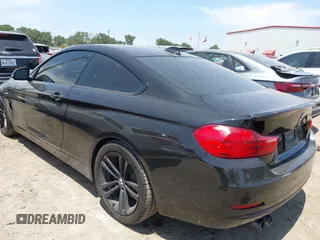 2014 BMW 4 Series 428i with VIN WBA3N3C54EF710642, listed as a IAAI auction lot 42319452 with 127,071 mi miles and . Bid and sale history available at DreamBid. Image 3.