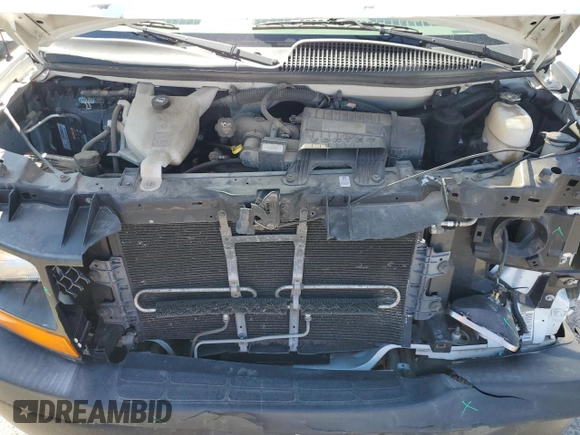 2012 Chevrolet Express Cargo z VIN 1GCWGFCA1C1193688, wystawiony jako Copart lot #54392185 z przebiegiem 133 617 mil mil oraz Szkoda całkowita • Salvage title. Historia ofert i sprzedaży dostępna na DreamBid. Obrazek 12.