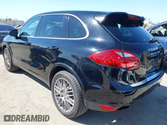 2012 Porsche Cayenne S Hybrid with VIN WP1AE2A23CLA93096, listed as a IAAI auction lot 41972843 with 79,139 mi miles. Bid and sale history available at carsss.com. Image 3.