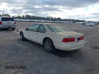 1996 Ford Thunderbird LX with VIN 1FALP62W4TH154400, listed as a IAAI auction lot 41394723 with 65,860 mi miles and . Bid and sale history available at DreamBid. Image 3.