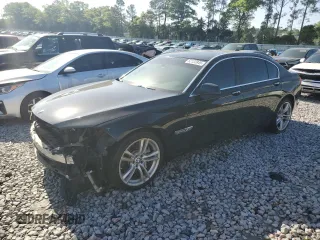 2009 BMW 7 Series 750Li with VIN WBAKB83589CY58091, listed as a Copart auction lot 52122845 with 182,442 mi miles and Salvage title. Bid and sale history available at DreamBid. Image 1.