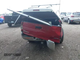 2014 Toyota Tacoma with VIN 5TFUX4EN3EX025837, listed as a IAAI auction lot 42430882 with 234,809 mi miles and . Bid and sale history available at DreamBid. Image 16.