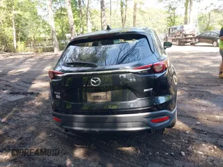 2016 Mazda CX-9 Sport with VIN JM3TCABY8G0112981, listed as a IAAI auction lot 42093389 with 106,384 mi miles. Bid and sale history available at carsss.com. Image 16.