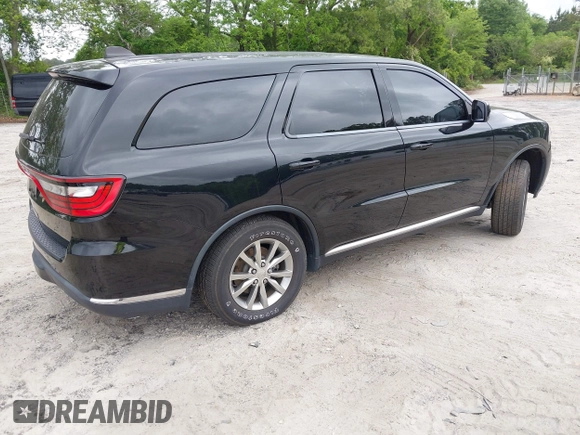 2018 Dodge Durango SXT with VIN 1C4RDHAG2JC412961, listed as a IAAI auction lot 42136418 with 100,477 mi miles and . Bid and sale history available at DreamBid. Image 4.