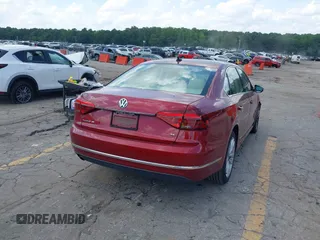 2017 Volkswagen Passat SE with VIN 1VWGT7A30HC058916, listed as a IAAI auction lot 42450554 with 82,960 mi miles and . Bid and sale history available at DreamBid. Image 4.
