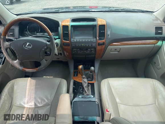 2005 Lexus GX 470 z VIN JTJBT20X550072373, wystawiony jako IAAI lot #42495387 z przebiegiem 221 554 mil mil oraz . Historia ofert i sprzedaży dostępna na DreamBid. Obrazek 6.