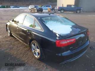 2012 Audi A6 Prestige z VIN WAUHGAFC0CN076036, wystawiony jako IAAI lot #41409687 z przebiegiem 54 601 mil mil oraz . Historia ofert i sprzedaży dostępna na DreamBid. Obrazek 3.