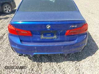2018 BMW M5 z VIN WBSJF0C53JB282658, wystawiony jako IAAI lot #39977648 z przebiegiem 28 001 mil mil oraz . Historia ofert i sprzedaży dostępna na DreamBid. Obrazek 16.