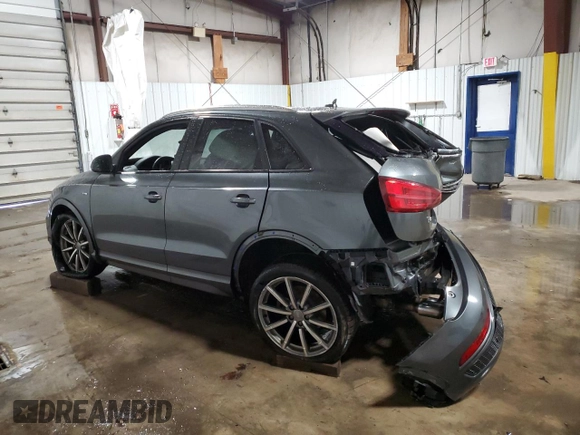 2018 Audi Q3 Premium with VIN WA1ECCFS3JR026977, listed as a Copart auction lot 44118955 with 94,373 mi miles and Salvage title. Bid and sale history available at DreamBid. Image 2.