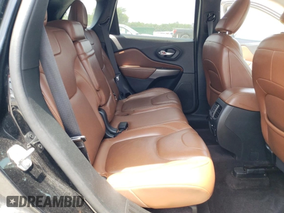 2019 Jeep Cherokee z VIN 1C4PJLJN0KD215834, wystawiony jako Copart lot #57652975 z przebiegiem 127 986 mil mil oraz Czysty tytuł • Clean title. Historia ofert i sprzedaży dostępna na DreamBid. Obrazek 11.